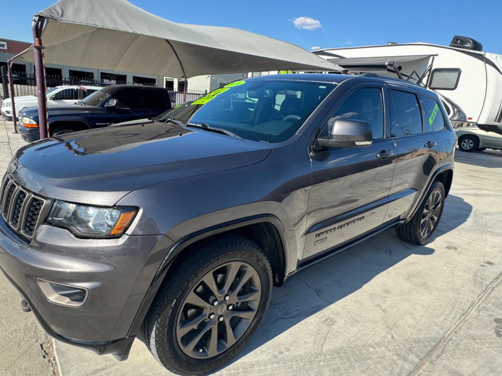2016 grey Jeep Grand Cherokee (1C4RJFBG0GC) , located at 2190 Hwy 95, Bullhead City, AZ, 86442, (928) 704-0060, 0.000000, 0.000000 - 75th anniversary edition. clean carfax. jeep grand cherokee limited 4 wd. Leather loaded. 81k miles. free and clear title. - Photo #16